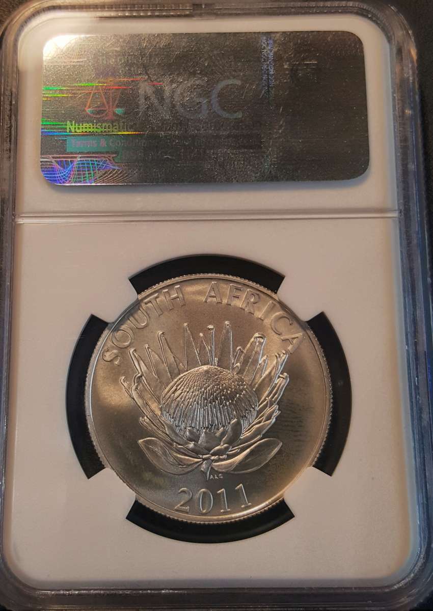 2011 Silver R1 JM Coetzee ADELAIDE OVERSTRIKE. NGC MS66. Rare coin in MS with overstrike.