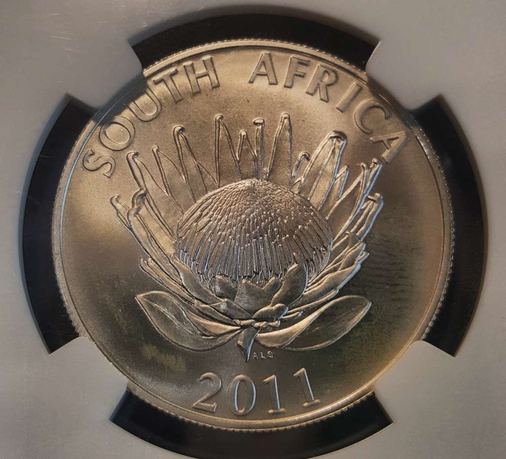 2011 Silver R1 JM Coetzee ADELAIDE OVERSTRIKE. NGC MS66. Rare coin in MS with overstrike.