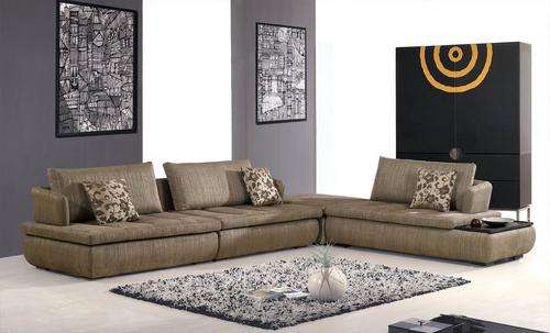 Corner Fabric Lounge Suite With Ottoman.