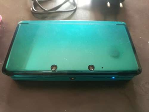 Nintendo 3DS with accessories and 29 games