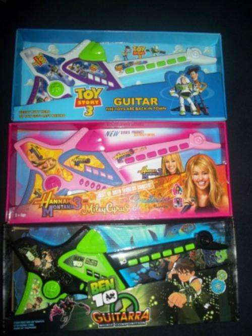 BEN 10 , HANNAH MONTANA OR TOY STORY ELECTICAL GUITAR