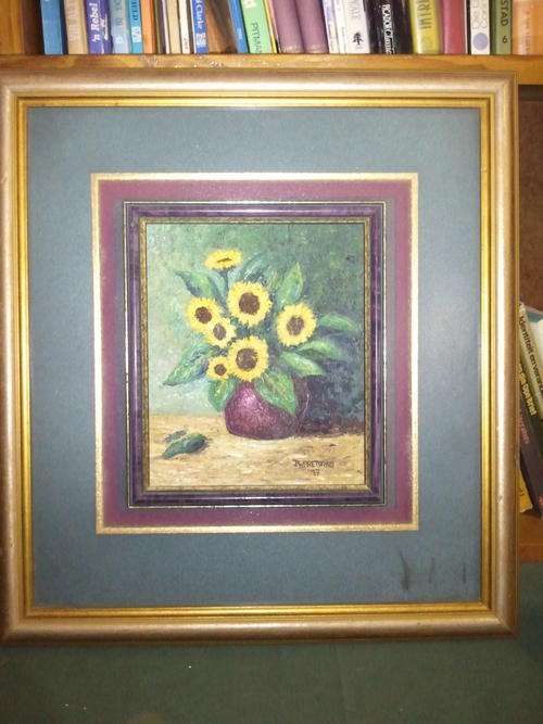 Sunflowers set in and on a beatiful frame *JW Pretorius 1997*