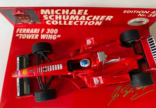 Michael Schumacher  - Ferrari F300 `Tower Wing` (Limited Edition Minichamps)
