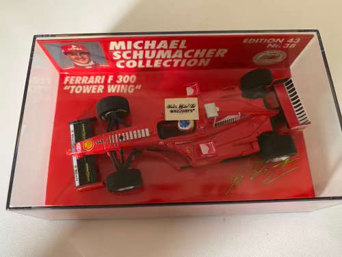 Michael Schumacher  - Ferrari F300 `Tower Wing` (Limited Edition Minichamps)