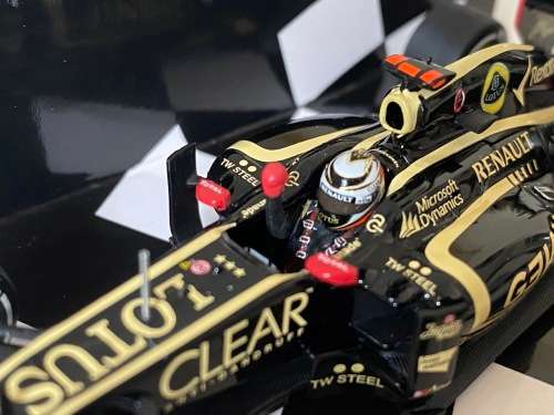 Kimi Räikkönen - Lotus 2012 (Winner Abu Dhabi, Ltd Edition Minichamps - new)
