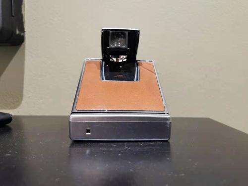broken polaroid sx-70 land camera