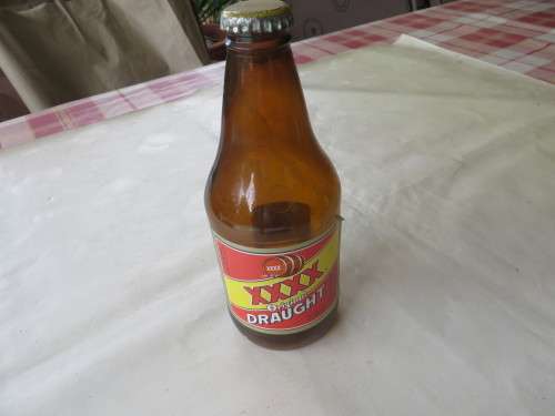 EMPTY BEER BOTTLE - XXXX DRAUGHT  - AUSTRALIA - AS PER SCAN B2