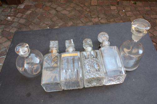 6 VARIOUS GLASS DECANTERS