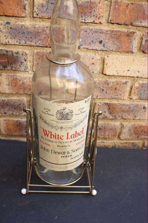 WHITE LABEL BOTTLE IN BRASS STAND - PLEASE HAVE A LOOK