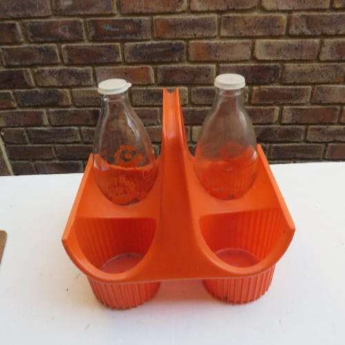 TWO OLD DAIRY BELLE ONE LITER MILK BOTTLES IN CARRYING TRAY