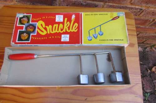 OLD DOUGH SNACKLE IRON - 150 MM WIDE - 390 MM LONG IN ORIGINAL BOX - AS PER SCAN