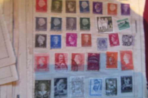 79 PAGES WITH HINGED WORLD STAMPS - BID PER PAGE