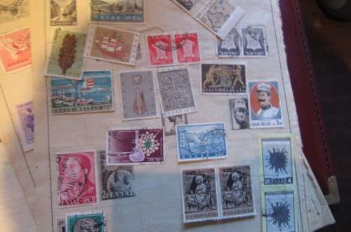 79 PAGES WITH HINGED WORLD STAMPS - BID PER PAGE