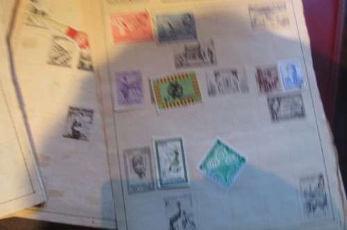 79 PAGES WITH HINGED WORLD STAMPS - BID PER PAGE