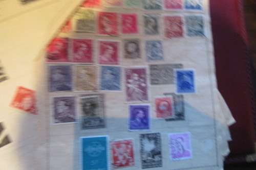79 PAGES WITH HINGED WORLD STAMPS - BID PER PAGE