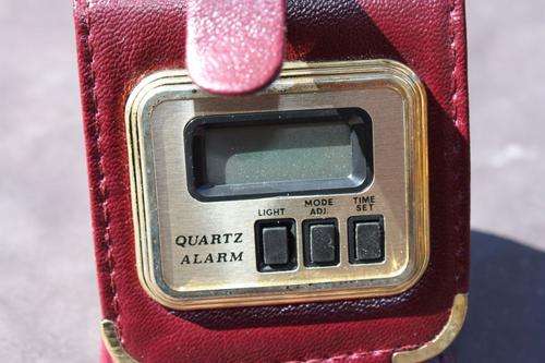 QUARTZ ALARM IN LEATHER COVER