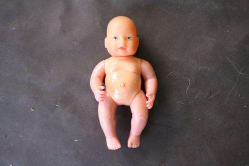 SMALL PLASTIC DOLL - 11 CM