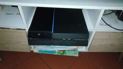 Playstation 4, two controllers, bunch of games