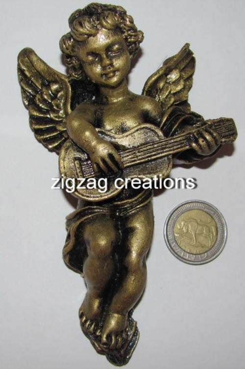 single large angel with guitar.double sided tape.resin product