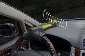 Electronic car steering wheel lock with alarm