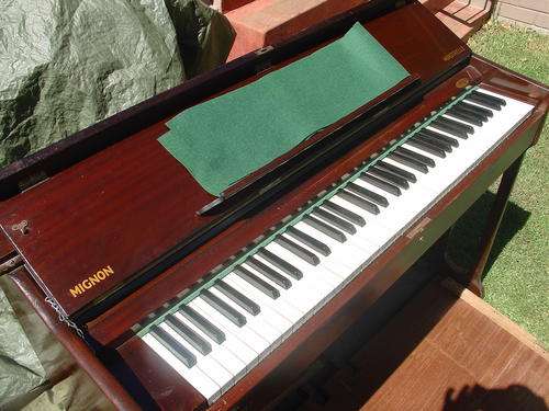 Mignan Minstrelle Piano in good working condition