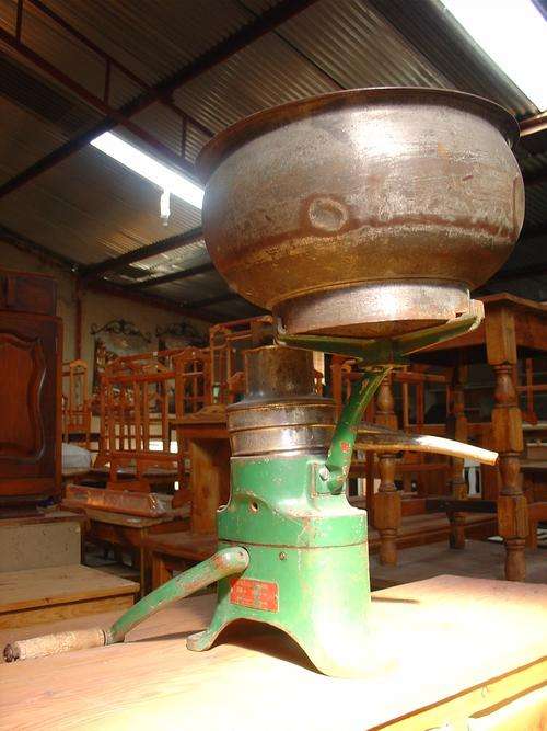 Cream Separator  (separates the cream from milk)