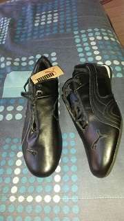 Puma shoes Brand new !!! Black - size 9- shipping R40