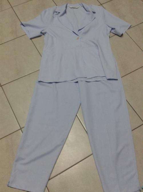 As new!! Milady's Light blue Suit... Size 36