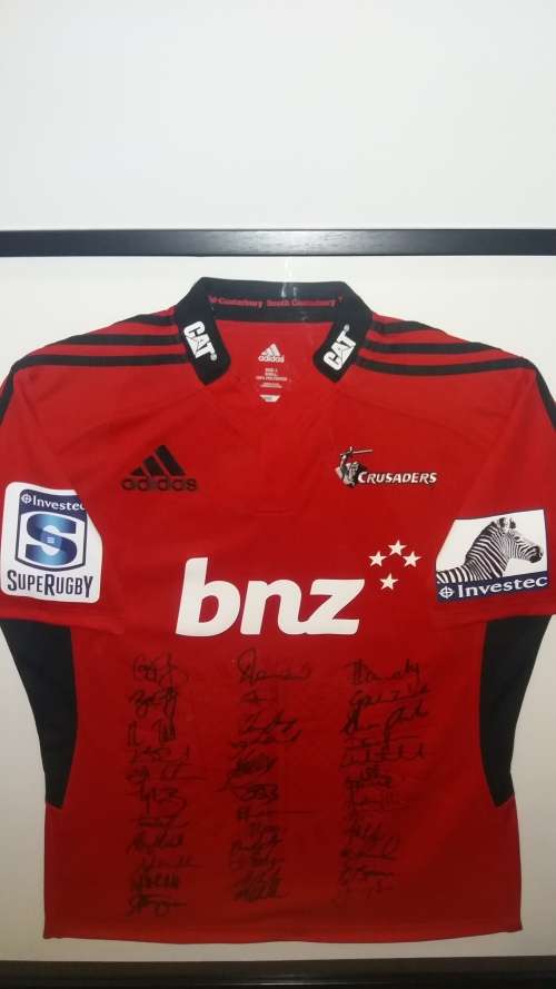 Signed Crusaders Rugby Jersey in frame