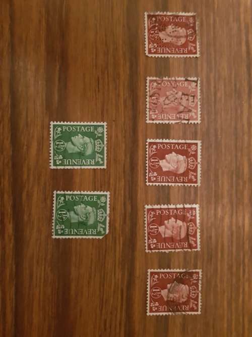 Numerous 1900's King George VI one and a half penny stamps,used, singles. Top left perfin AS AN.