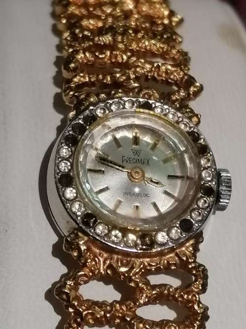 A Ladies Precimax Stylish Cocktail watch with gold clad strap