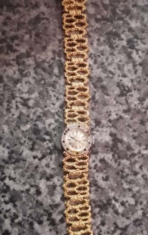 A Ladies Precimax Stylish Cocktail watch with gold clad strap