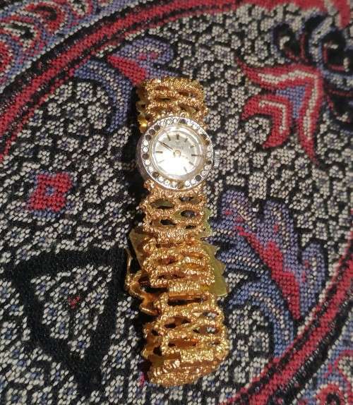 A Ladies Precimax Stylish Cocktail watch with gold clad strap