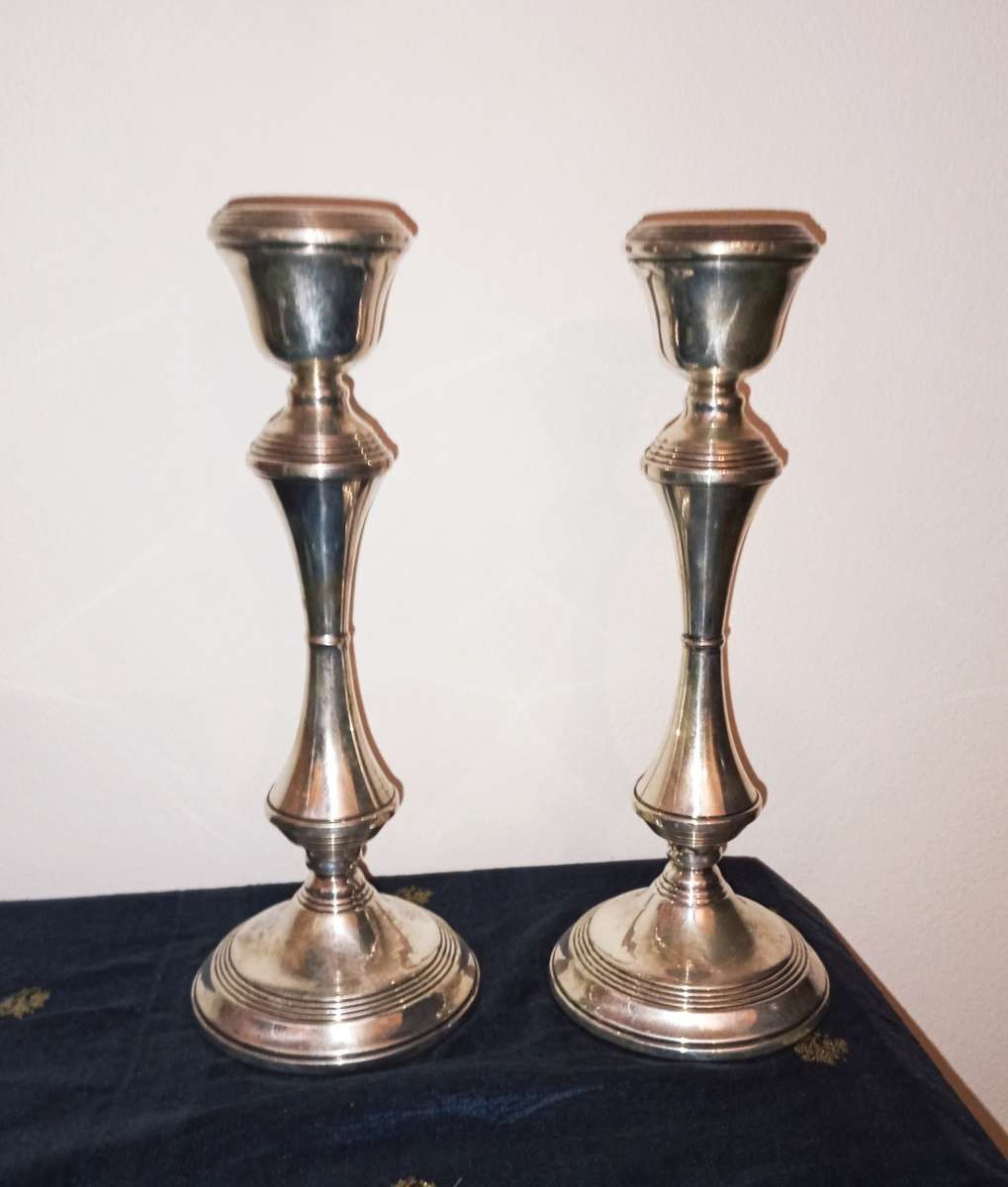 A lovely pair of silver candlesticks