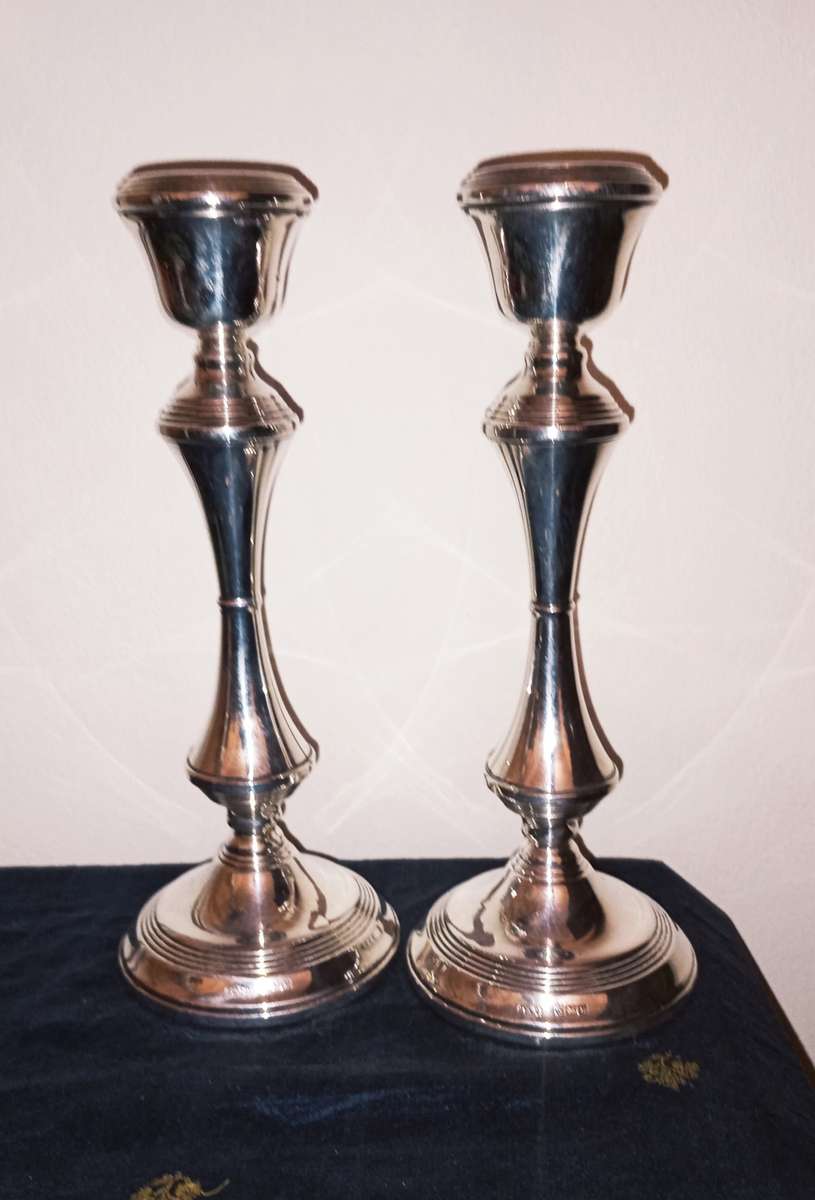 A lovely pair of silver candlesticks