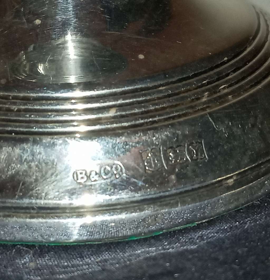 A lovely pair of silver candlesticks