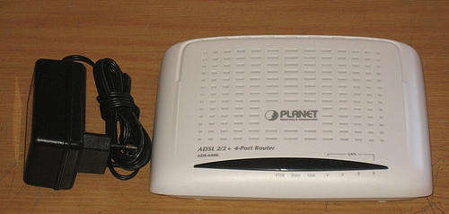 Planet ADE4400 - ADSL 4 Port Router (Modem/Switch/Firewall)
