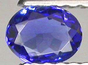 3 x SLIGHTLY INCLUDED (S1)  .30CTS TANZANITE