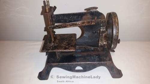 GERMAN FOREIGN TOY SEWING MACHINE