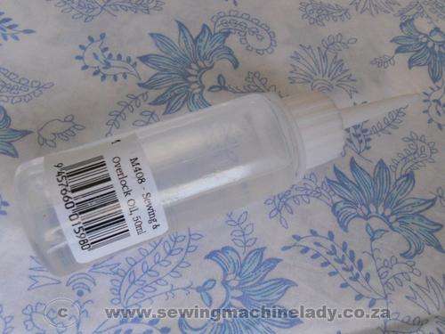 SEWING MACHINE OIL & BRUSH 2-SIDED