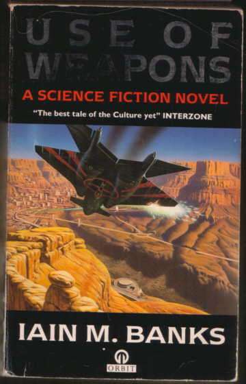 Iain M. Banks-  " Use of Weapons".   Paperback as description