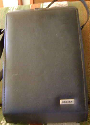 Pentax camera leather travel case as description.