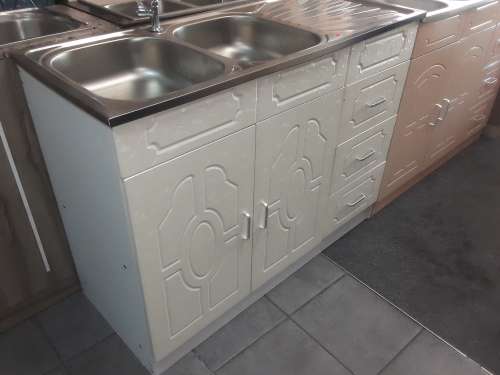 Kitchen  cabinets with sink and tap