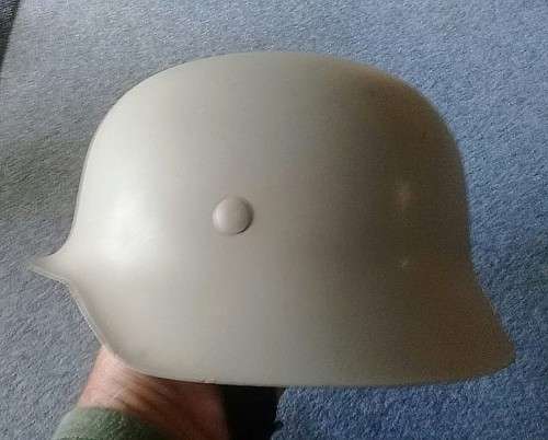 Classic German `steel` helmet - lightweight made from fibreglass with chinstrap. Size about 59cm.