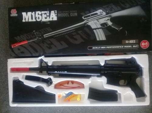 Airsoft M16 rifle with accessories. Spring action.