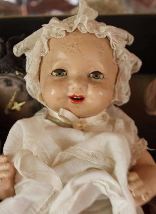 Small very old composition antique doll.