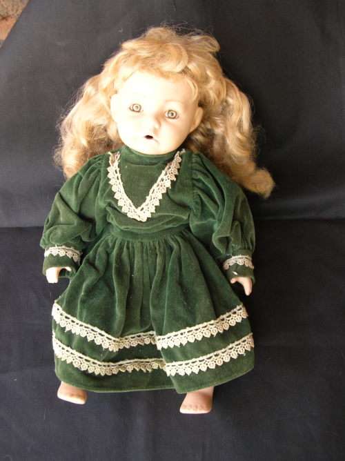 Porcelain Doll Approx 32cm's High. See pics and discription for more details