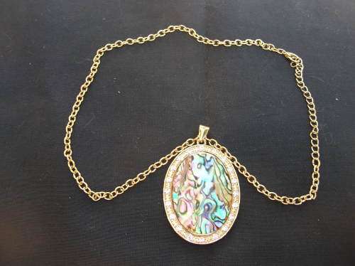 Mother of pearl Necklace with 20 cubic Zirconia's. Please see pics for details