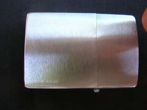 Zippo Lighter, and leather pouch, almost as good as new. See pics , and description for details