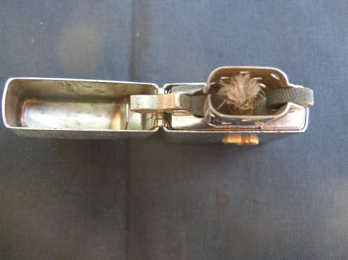 Zippo Lighter, and leather pouch, almost as good as new. See pics , and description for details